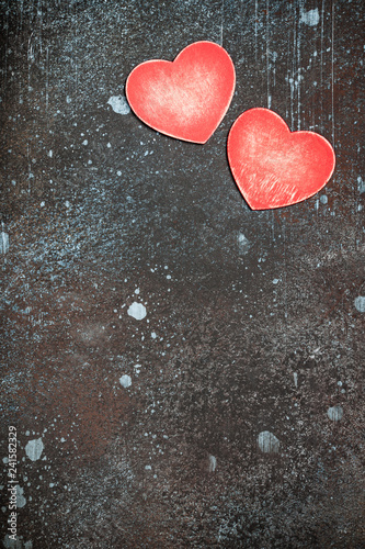 Valentine's Day background with red wooden hearts