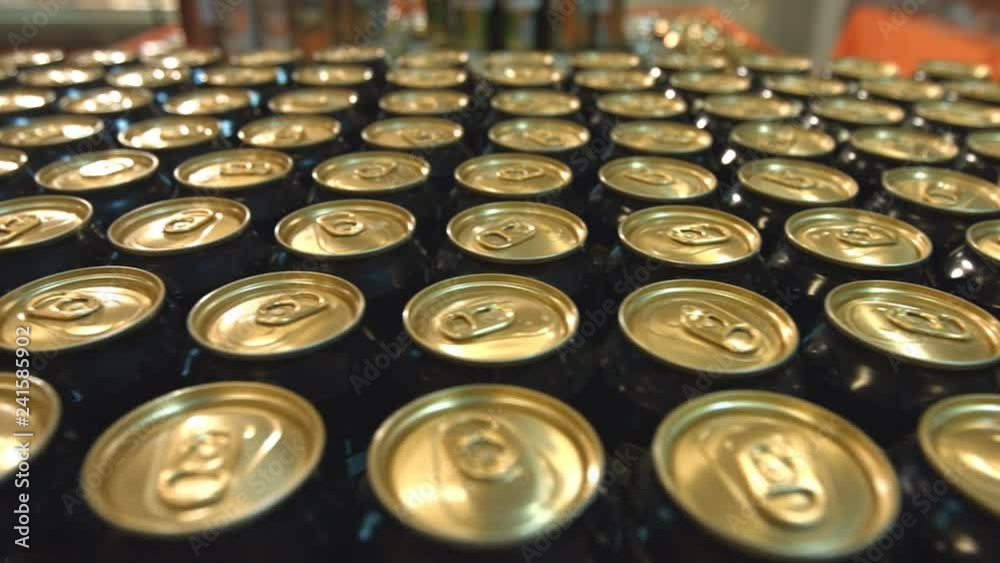 Beer in supermarket.
Many cans of beer are on counter in the store. Beer in supermarket.
Many cans of beer are on counter in the store.