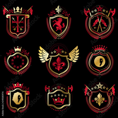 Set of vector vintage emblems created with decorative elements like crowns, stars, bird wings, armory and animals. Collection of heraldic coat of arms.