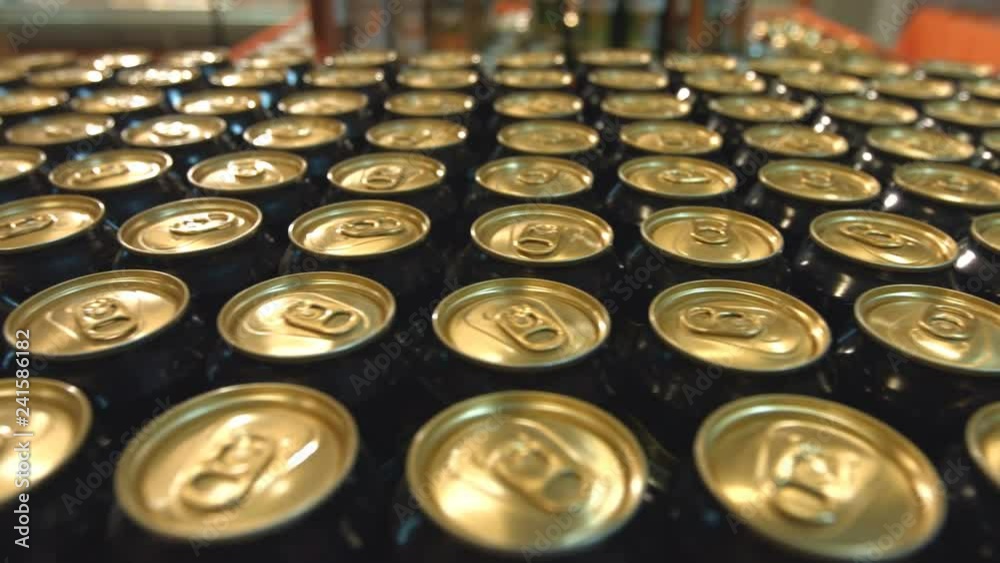 Beer in supermarket.
Many cans of beer are on counter in the store. Beer in supermarket.
Many cans of beer are on counter in the store.