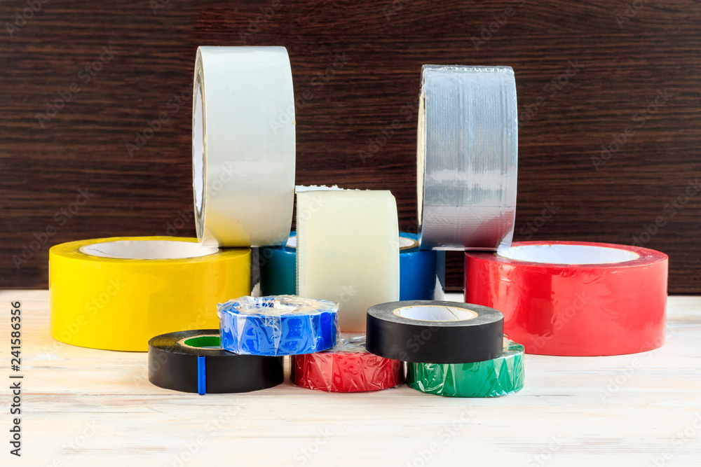 Zdjęcie Stock A few rolls of duct tape stack of electrical tape stand