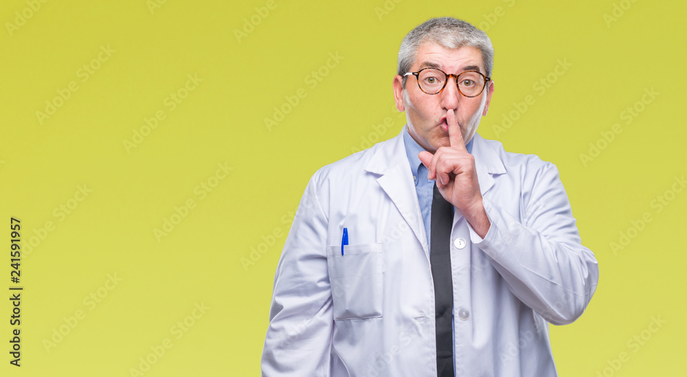 Handsome senior doctor, scientist professional man wearing white coat over isolated background asking to be quiet with finger on lips. Silence and secret concept. Handsome senior doctor, scientist professional man wearing white coat over isolated background asking to be quiet with finger on lips. Silence and secret concept.