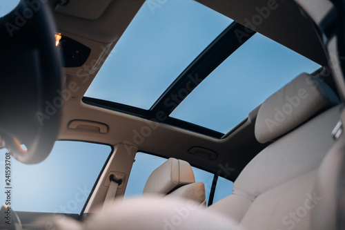 Panoramic sun roof in the car photo