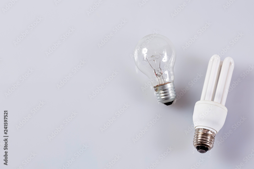 Traditional and energy efficient bulb Traditional and energy efficient bulb