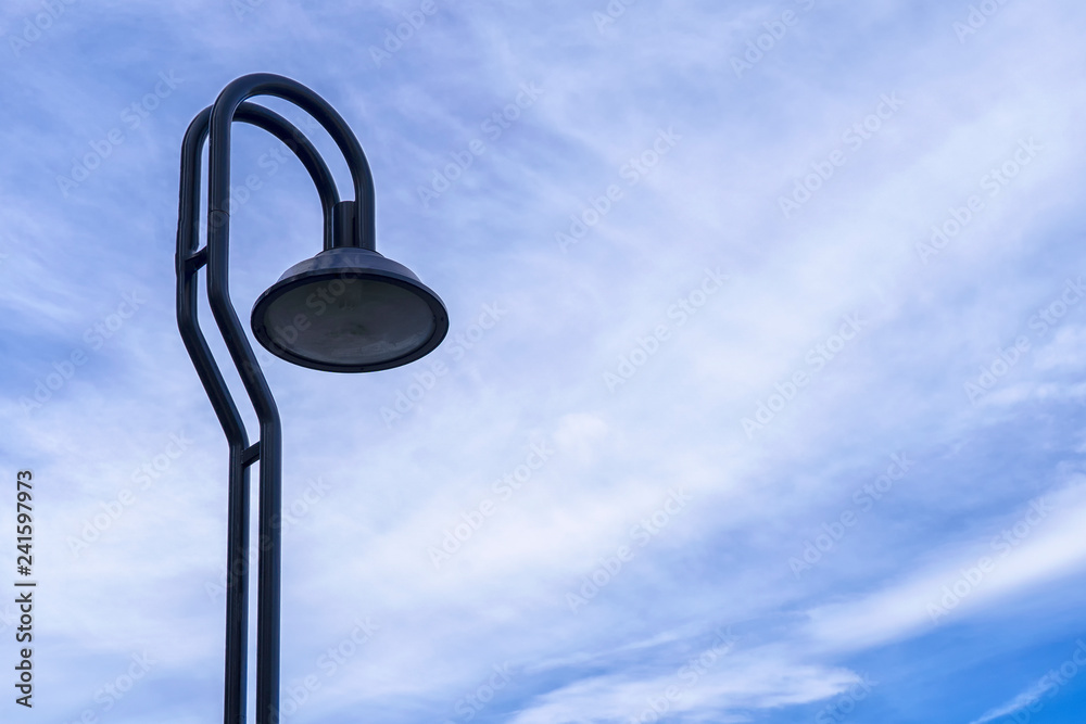 Street lamp or light pole with blue sky background Street lamp or light pole with blue sky background