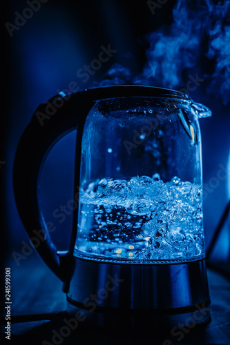 beautifully boiling glass teapot with light