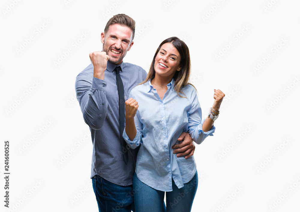 Young workers business couple over isolated background very happy and excited doing winner gesture with arms raised, smiling and screaming for success. Celebration concept. Young workers business couple over isolated background very happy and excited doing winner gesture with arms raised, smiling and screaming for success. Celebration concept.