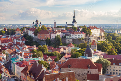 Red roofs of old town Tallinn, Estonia at sunny day photo