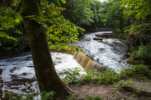 Cascades on the river shoy with a long exposure. Forest wet mood of Estonia. photo