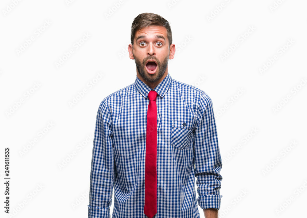 Young handsome business man over isolated background afraid and shocked with surprise expression, fear and excited face. Young handsome business man over isolated background afraid and shocked with surprise expression, fear and excited face.