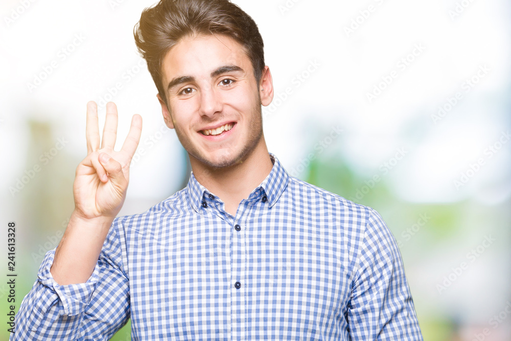 Young handsome business man over isolated background showing and pointing up with fingers number three while smiling confident and happy. Young handsome business man over isolated background showing and pointing up with fingers number three while smiling confident and happy.