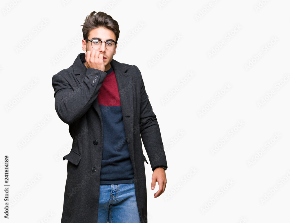 Young handsome elegant man wearing glasses over isolated background looking stressed and nervous with hands on mouth biting nails. Anxiety problem. Young handsome elegant man wearing glasses over isolated background looking stressed and nervous with hands on mouth biting nails. Anxiety problem.