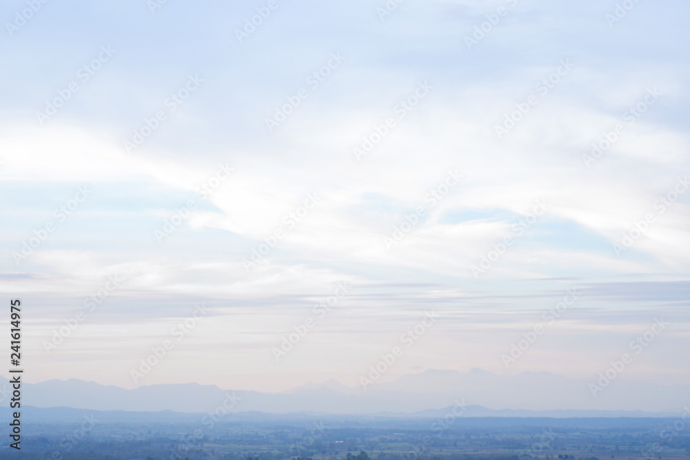 The sky is soft and colorful for the background, with space for text input. Natural view in northern Thailand.