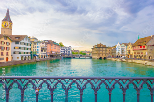 riverside view of lake Zurich. Houses and building with cloudy sky background along with lake -  Zurich, Switzerland. 