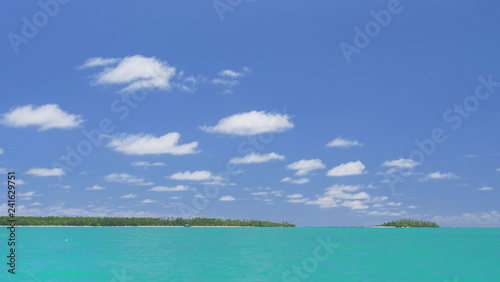 COPY SPACE: Picturesque view of two remote tropical islands in the distance.