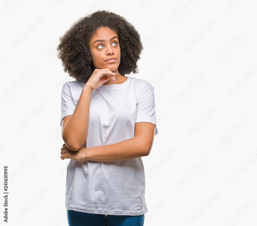 Young afro american woman over isolated background with hand on chin thinking about question, pensive expression. Smiling with thoughtful face. Doubt concept. Young afro american woman over isolated background with hand on chin thinking about question, pensive expression. Smiling with thoughtful face. Doubt concept.