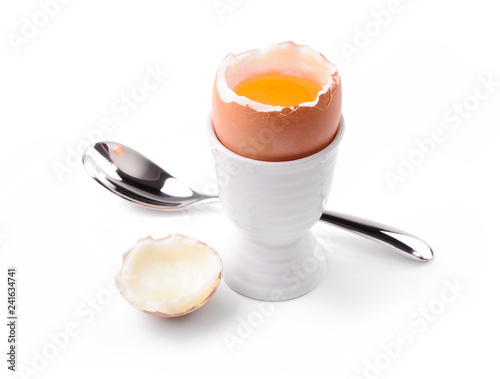 Soft boiled egg on white background. Uovo alla coque
