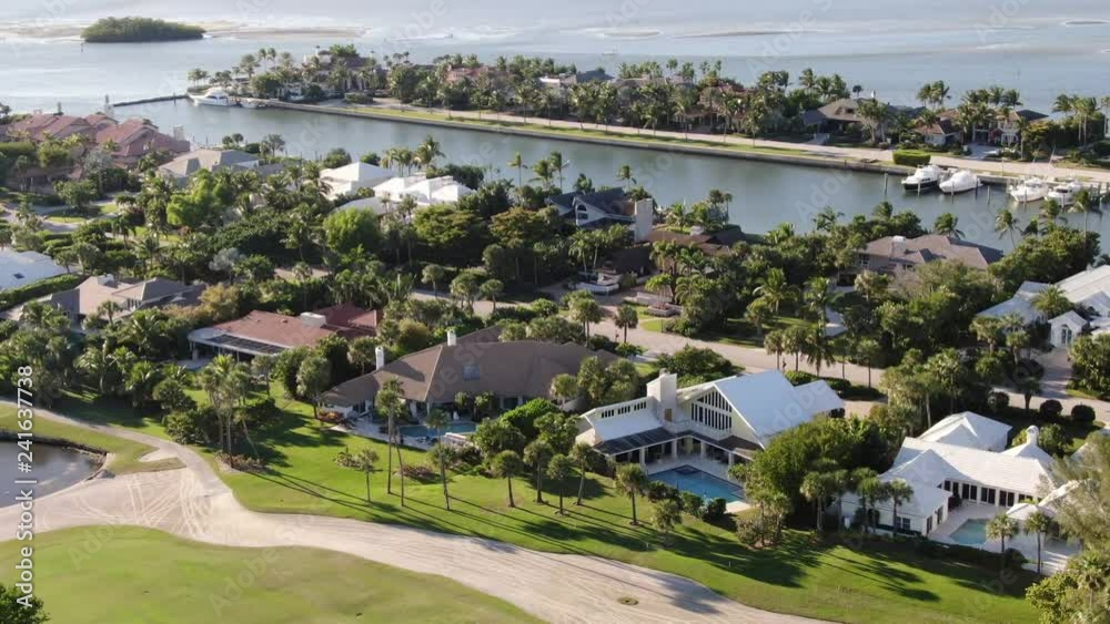 View of Aerial of luxury homes lining Port St. Lucie's waterfront, with views ...