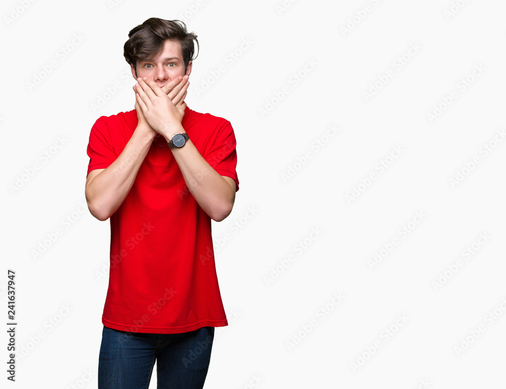 Young handsome man wearing red t-shirt over isolated background shocked covering mouth with hands for mistake. Secret concept. Young handsome man wearing red t-shirt over isolated background shocked covering mouth with hands for mistake. Secret concept.