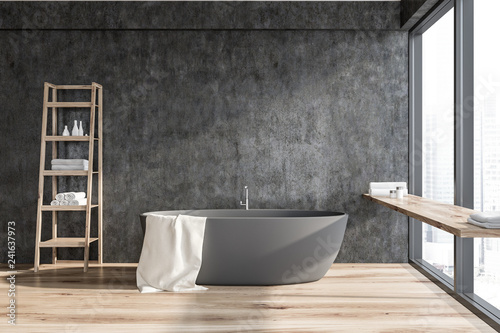 Dark gray bathroom with tub