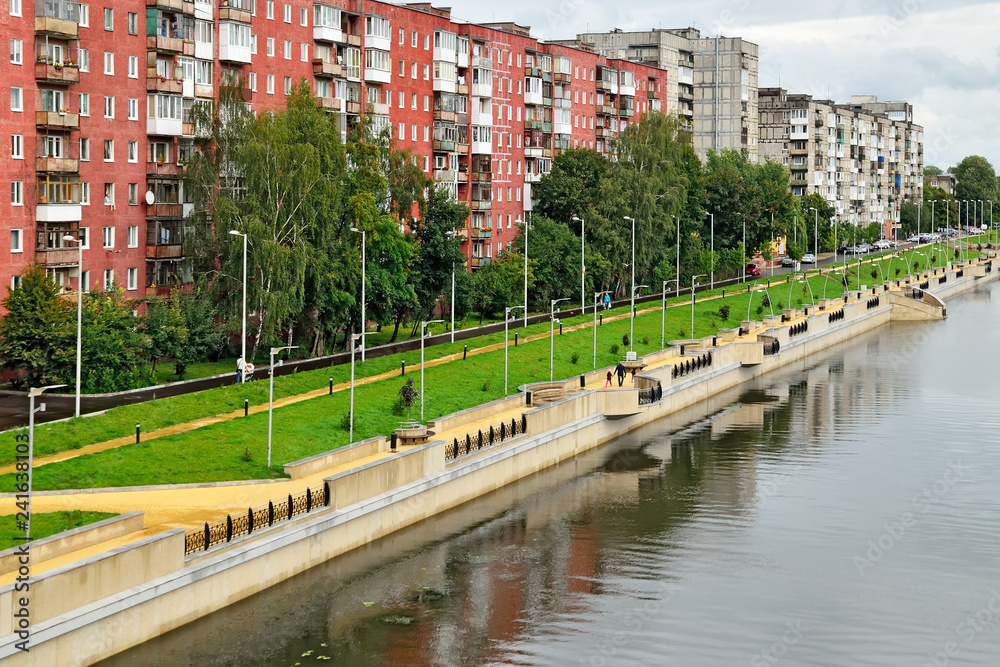 Kaliningrad, Russia - 18 August 2016: townspeople walk on the new promenade Admiral Tributs Kaliningrad, Russia - 18 August 2016: townspeople walk on the new promenade Admiral Tributs
