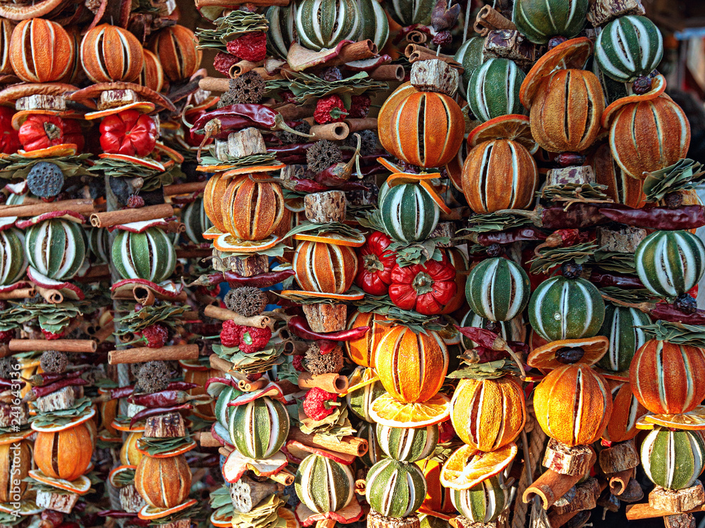 Traditional Christmas decoration made of dry vegetables and fruits at the Christmas market. Vienna, Austria.
