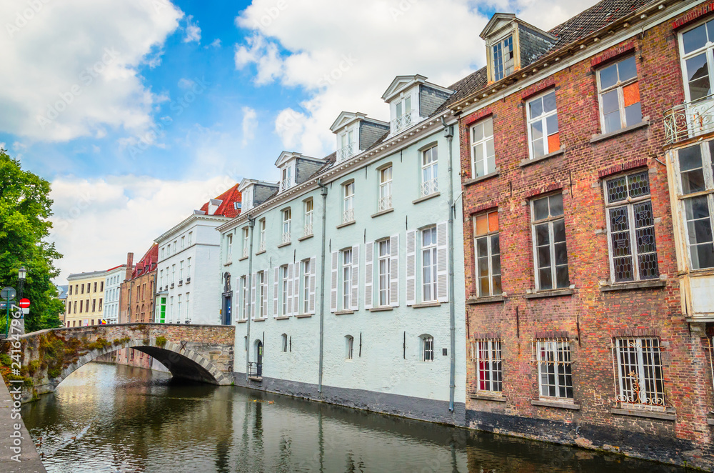 Beautiful canal and traditional houses in the old town of Bruges (Brugge), Belgium