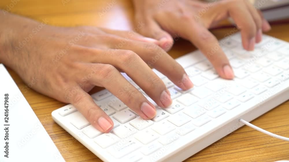 Business people hands on keyboard searching information data internet in modern office. Ideas for working paperwork and Accounting planning budget Annual report file teachology concept Business people hands on keyboard searching information data internet in modern office. Ideas for working paperwork and Accounting planning budget Annual report file teachology concept