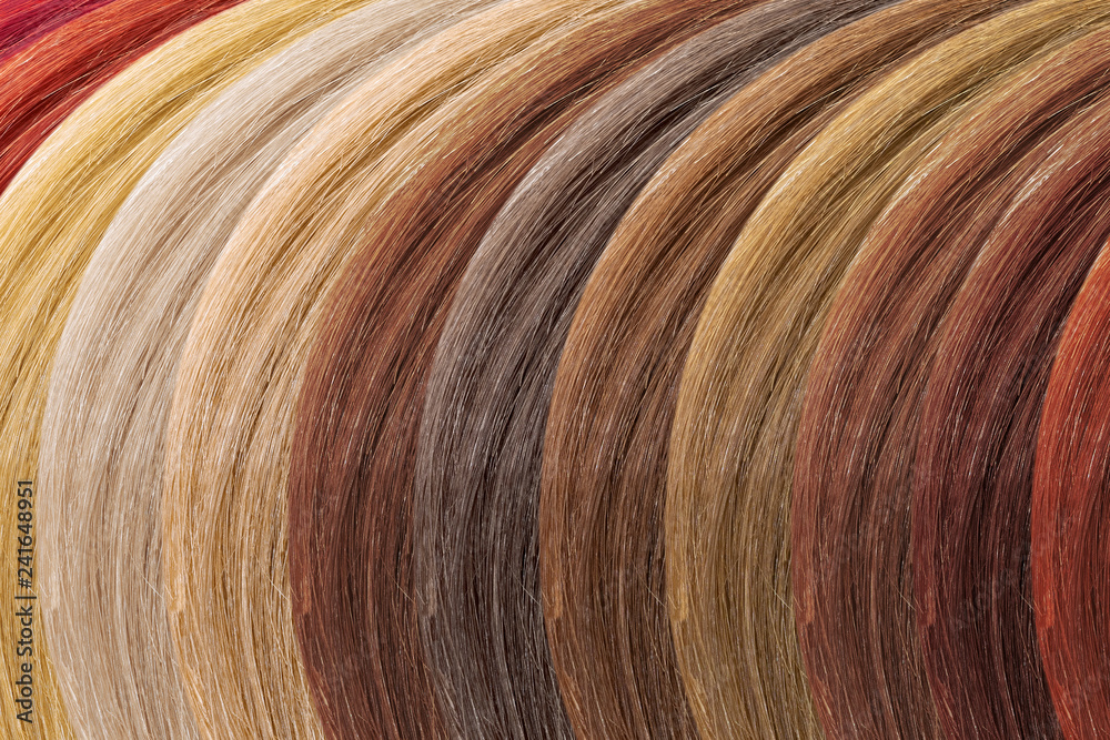 Fototapeta premium Hair colors palette as background. Dyed samples