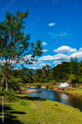 Small canal with mountain in Mueang Khong district photo