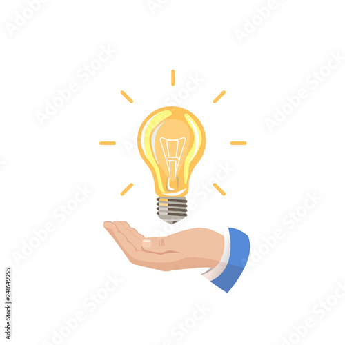 The hand holds light bulb. The electric light is on. Energy saving. Suggest idea