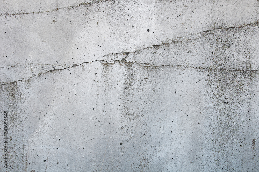 Obraz premium Gray concrete texture background. Cracks. Scratches. Damage.