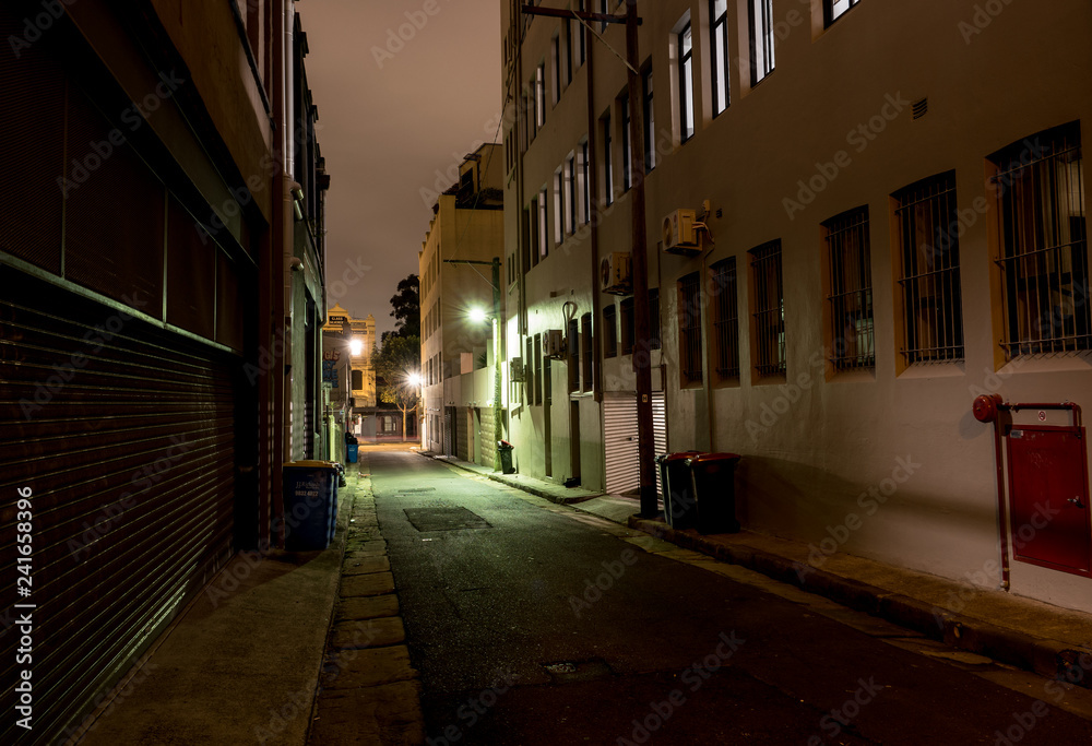 dark alley at night under cloud