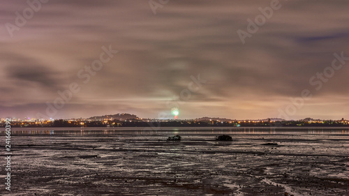 View of fireworks across the bay from Te Atatu peninsula towards Auckland city photo