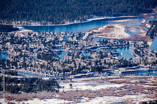 Aerial view of a residential area in South Lake Tahoe, with houses built on the shores of man made canals, California; sunny winter day