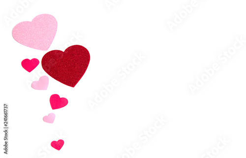 Group of pink and red hearts isolated over white as a background.