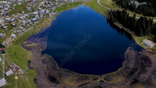 The beautiful  video of the natural lake and mountains around it taken by drone