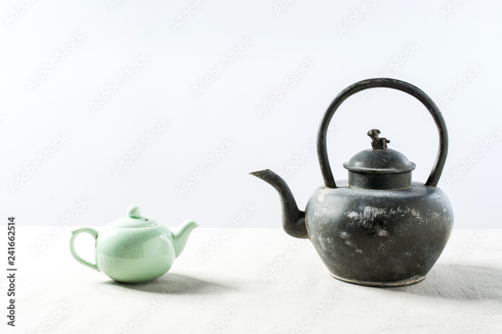 Now teapot and antique teapot Now teapot and antique teapot
