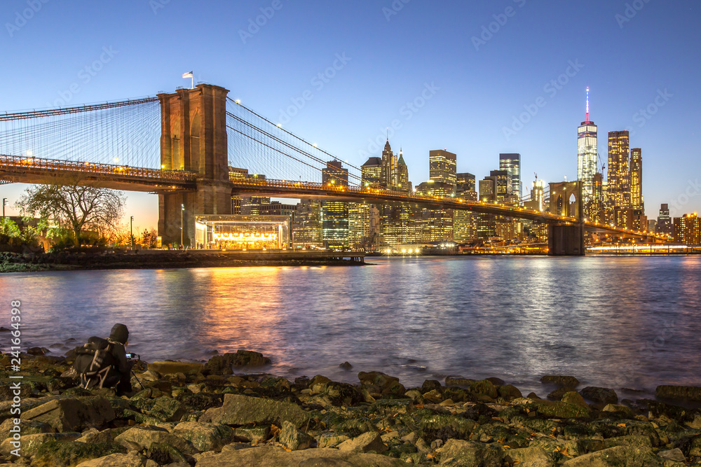 Brooklyn bridge and New York City at sunset