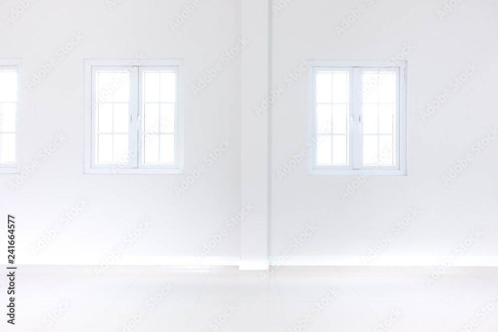 Empty white room with windows Empty white room with windows