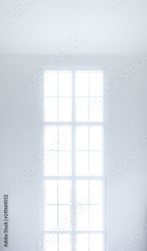 Empty white room with windows