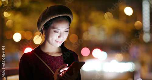 Photography Woman use of cellphone in city