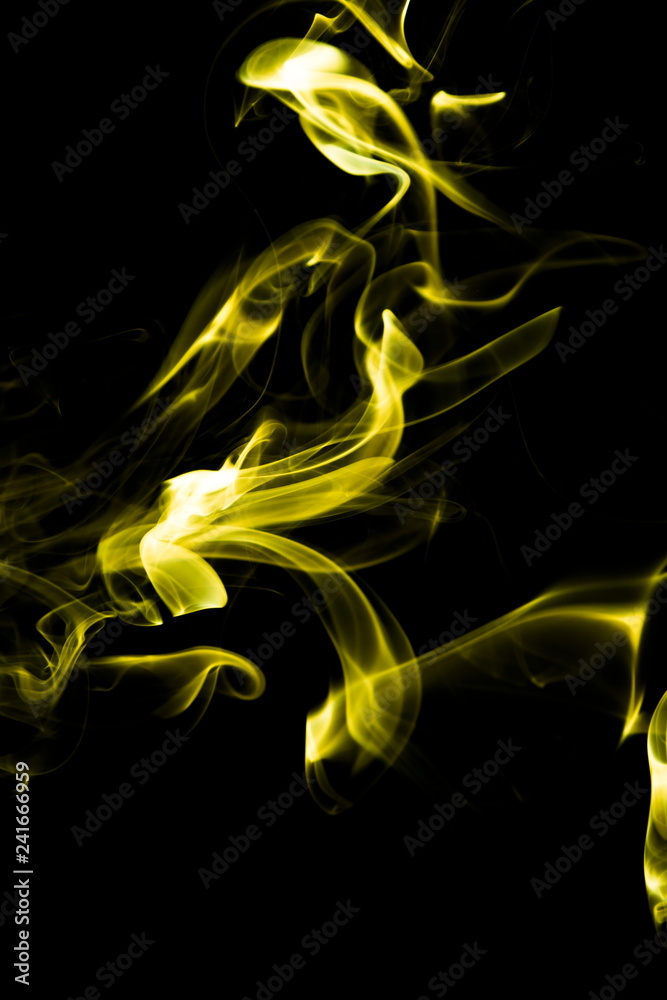 Yellow smoke on black background Yellow smoke on black background