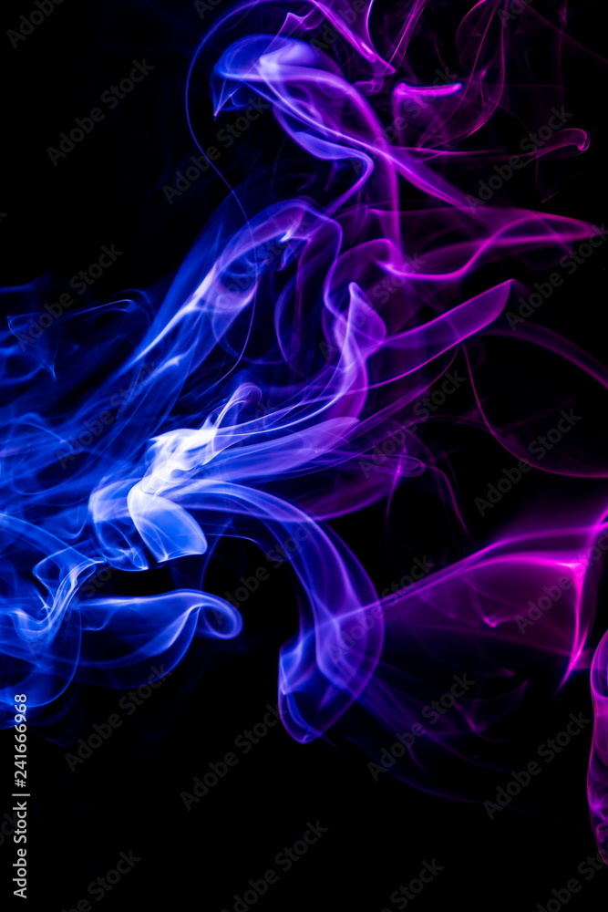 Colored smoke on black background