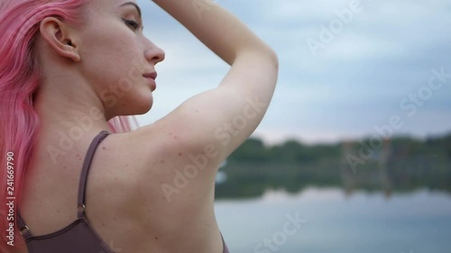 Wallpaper Mural Beautiful pink haired model posing in swimsuit at sunset Torontodigital.ca
