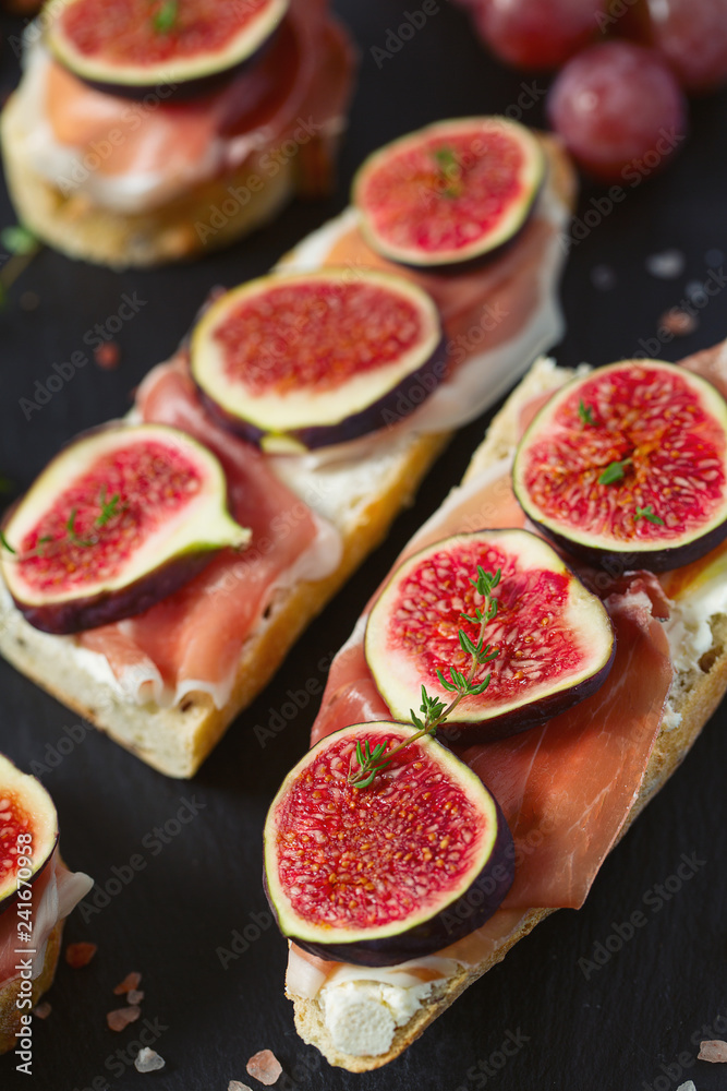 whole bread with cheese, parma ham and figs whole bread with cheese, parma ham and figs