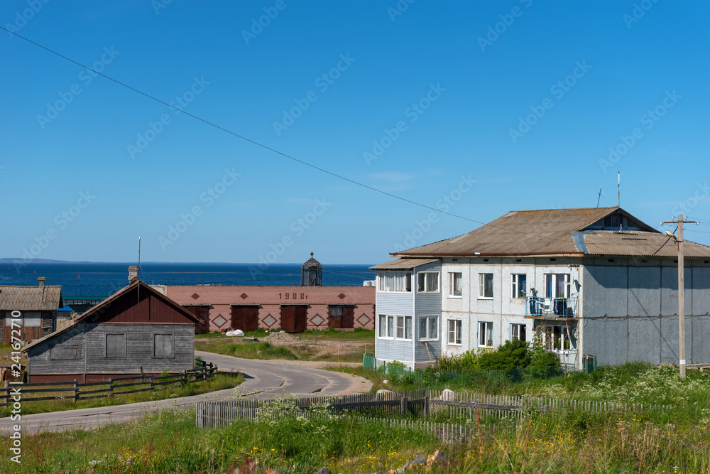 SOLOVKI, REPUBLIC OF KARELIA, RUSSIA - JUNE 25, 2018: Solovetsky village on Solovki Island. Solovetsky archipelago, Arkhangelsk Region, Russia SOLOVKI, REPUBLIC OF KARELIA, RUSSIA - JUNE 25, 2018: Solovetsky village on Solovki Island. Solovetsky archipelago, Arkhangelsk Region, Russia