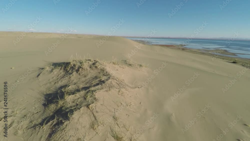 Mongolia. Sand dunes and lake. Mongolia. Sand dunes and lake.