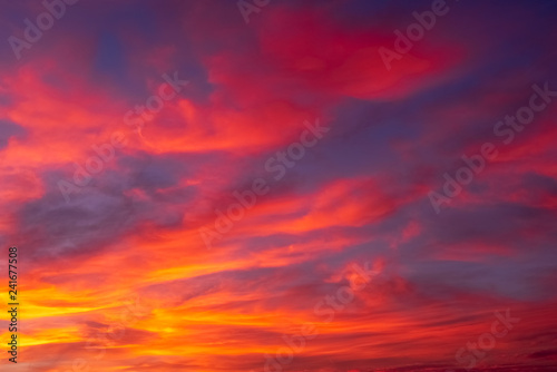 Nice colorful background of the sunset sky © IonelV