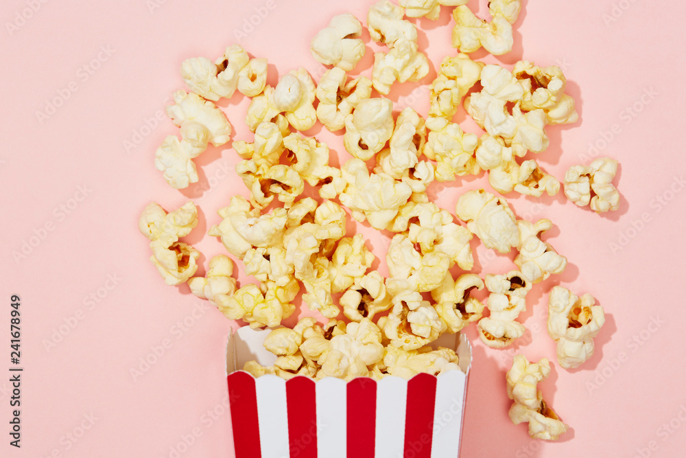 Full of popcorn in classic striped box Full of popcorn in classic striped box